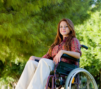 Image of young woman in a wheelchair